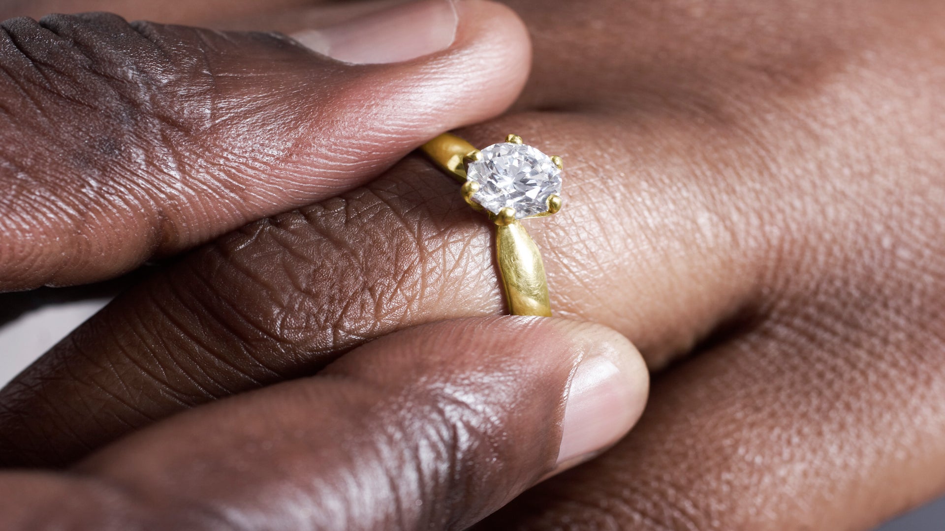 should-you-wear-an-engagement-ring-during-a-job-interview-essence