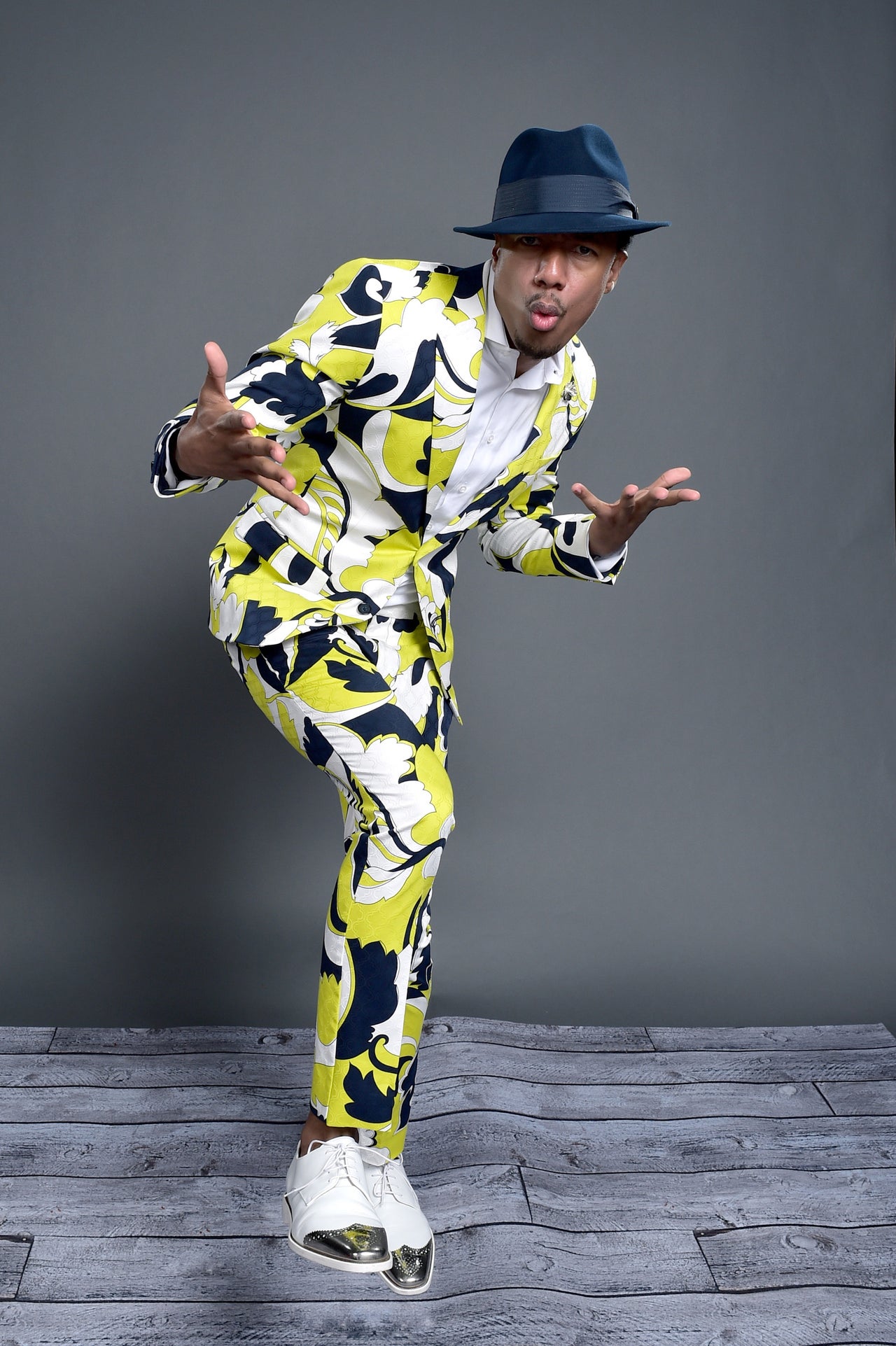 Nick Cannon flaunts his flamboyant fashion sense in NYC