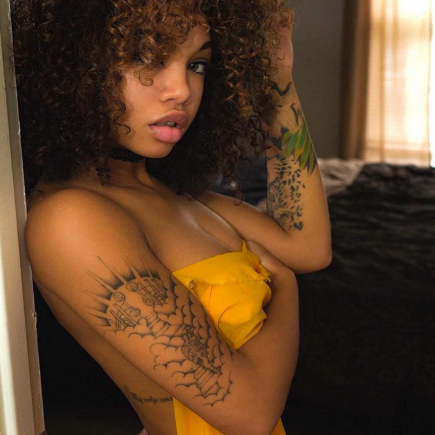 black women arm tattoos