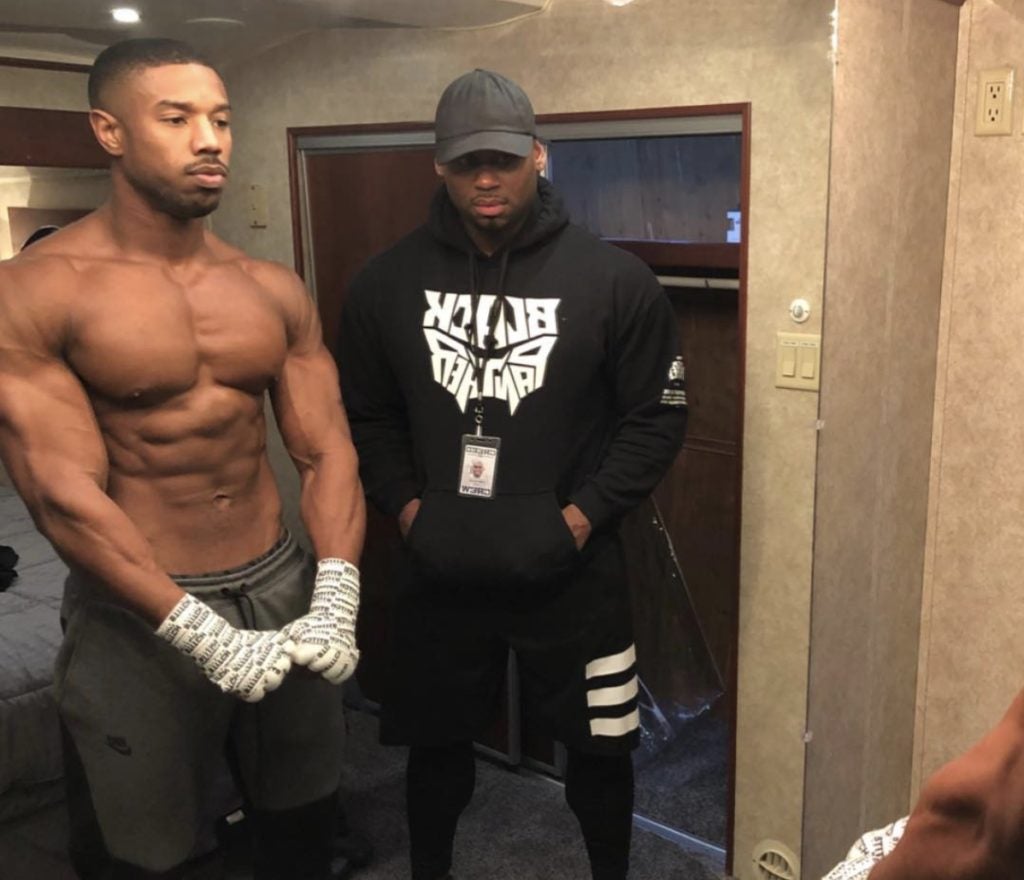 Watch Michael B. Jordan And His Trainer Hilariously Break Down The Secrets To That Rock Hard Physique We Loved In 'Creed - Essence