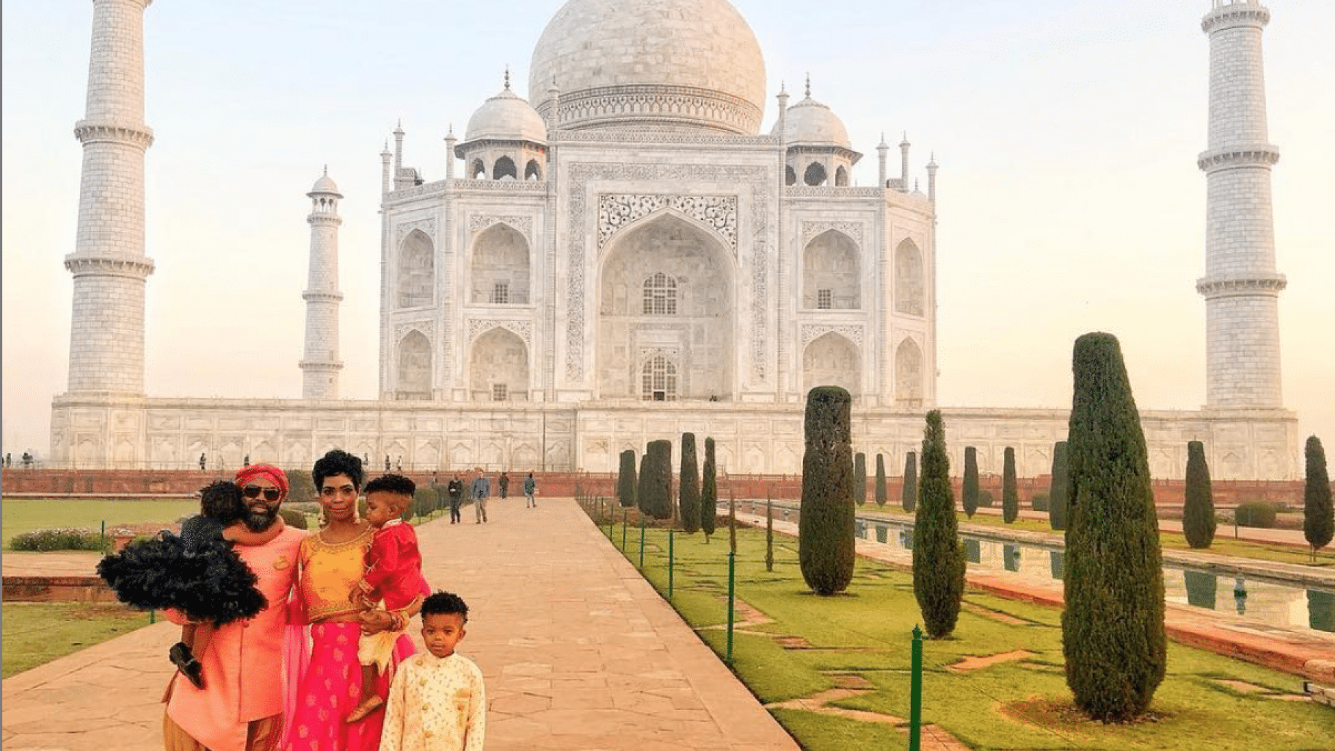 Black Travel Moment of the Day: We Love This Sweet Family Photo Opp At The Taj Mahal