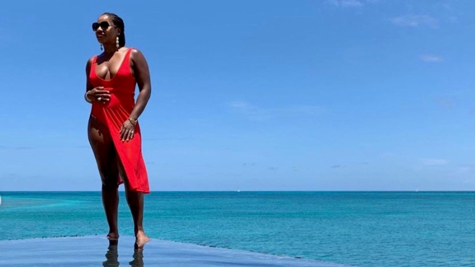 Black Travel Vibes: Take a Dip in the Endless Blue Waters of Antigua