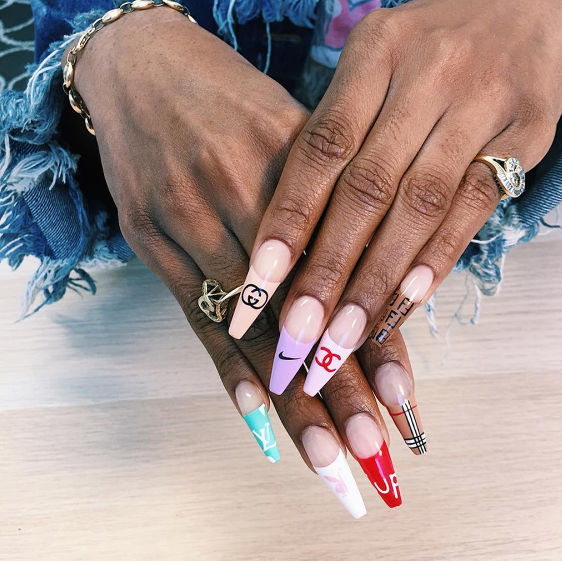 9 Reasons To Get Into Logo Nails This Spring