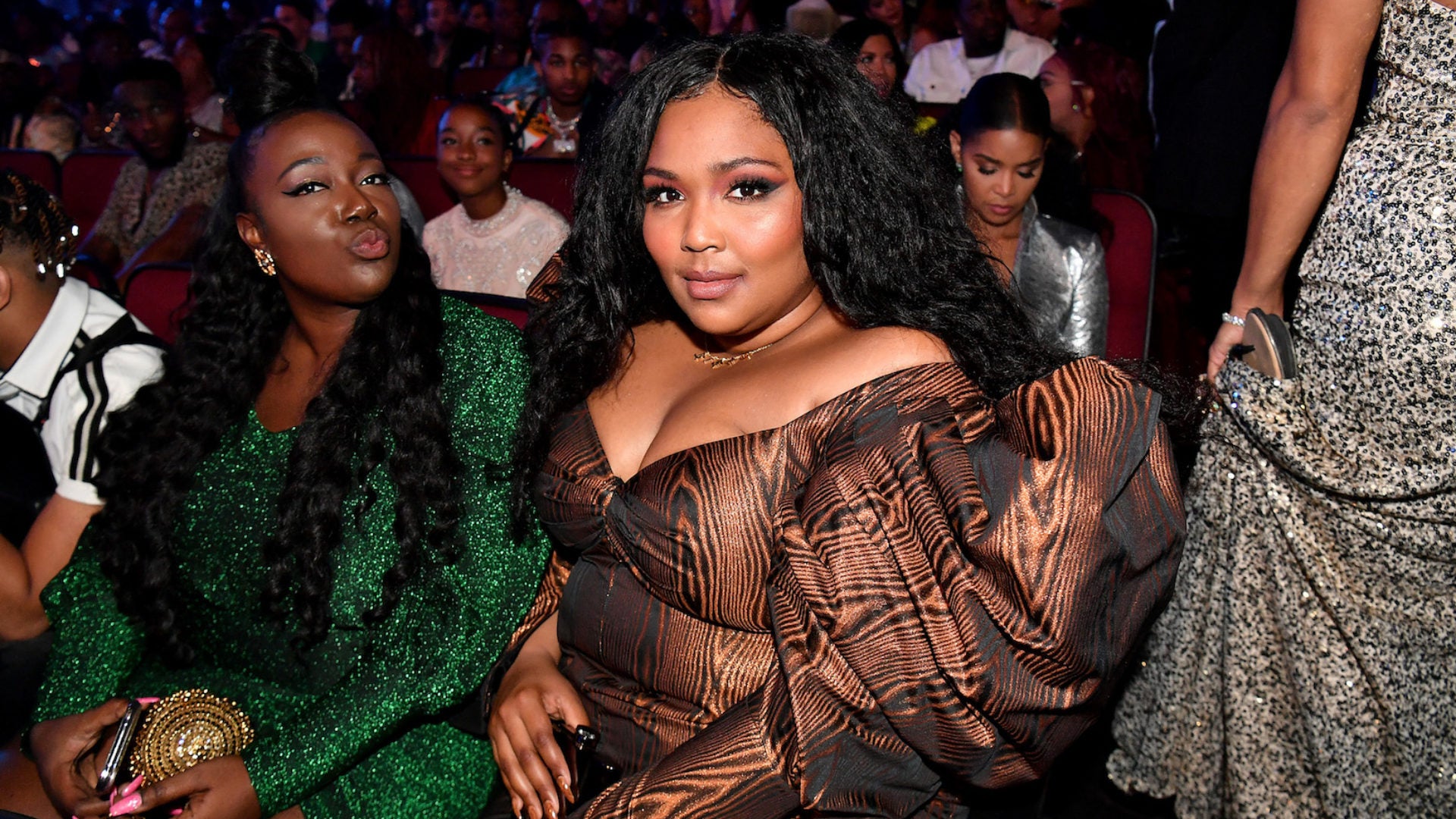 Lizzo Says 'Bigoted' Security Guard Attacked Her Team At Summerfest