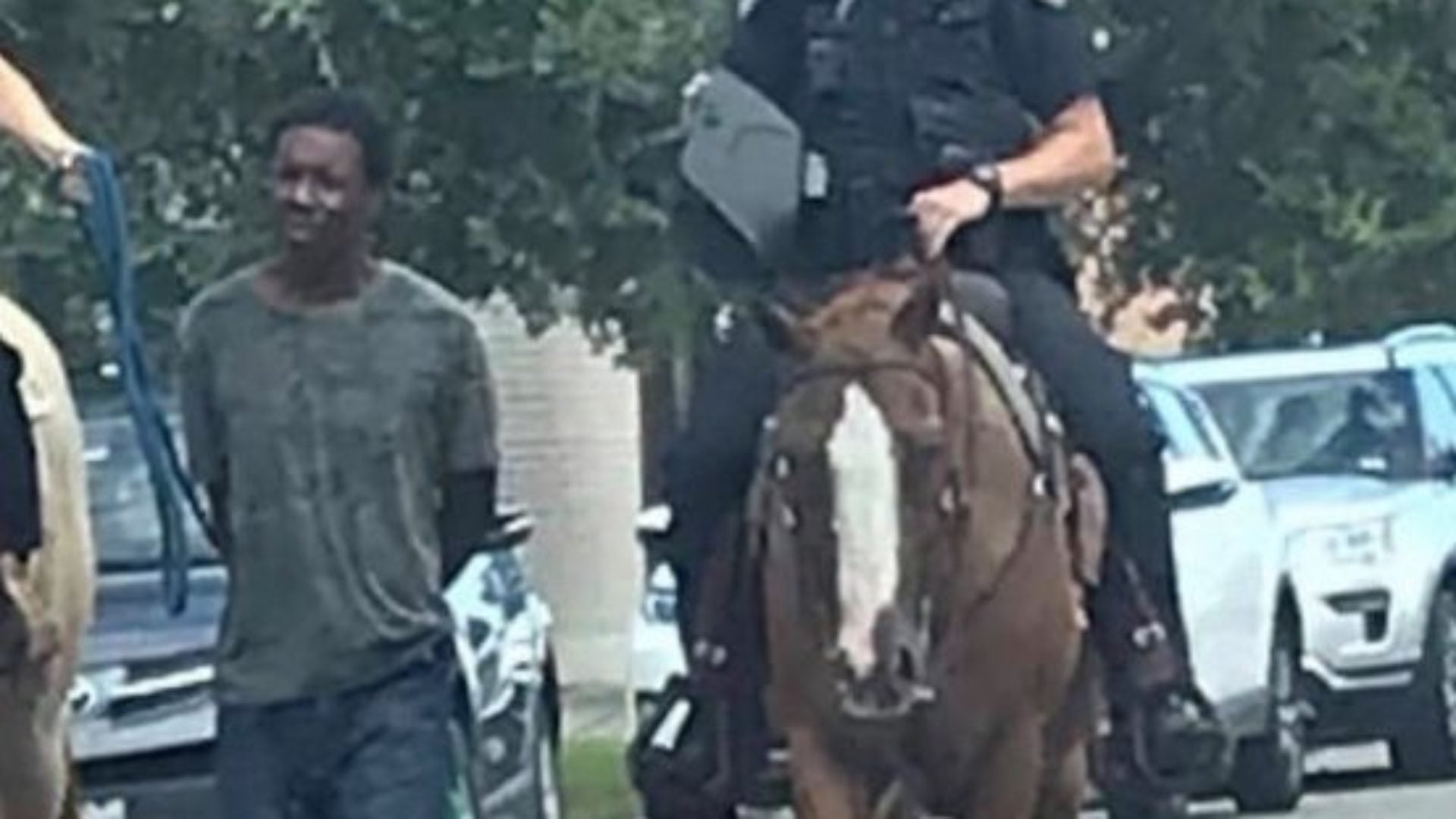 Texas Police Blasted After Mounted Officers Pictured Leading Black Man By Leash