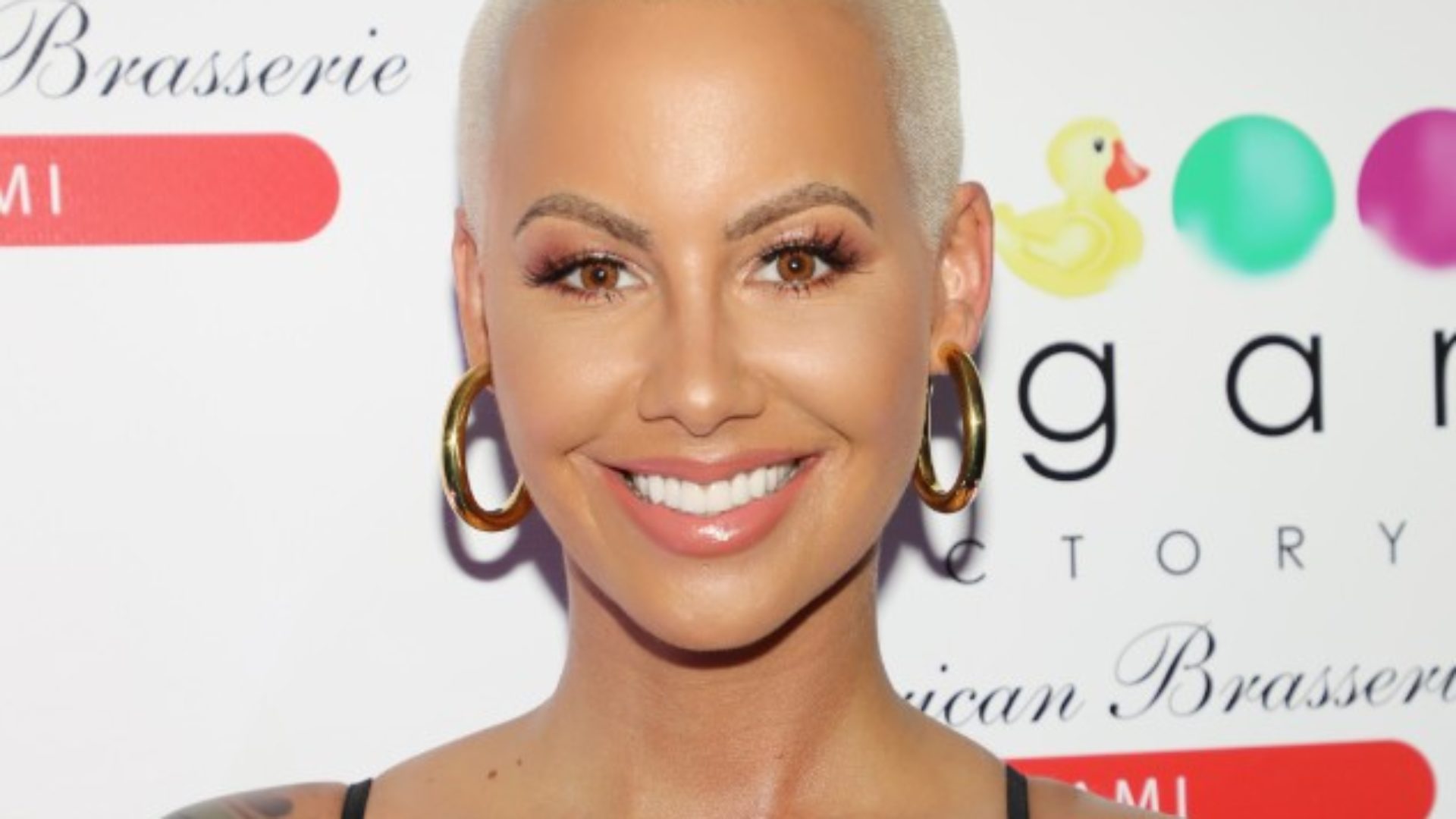 Amber Rose Shows Off Her Growing Baby Bump and Beautiful Black Hair