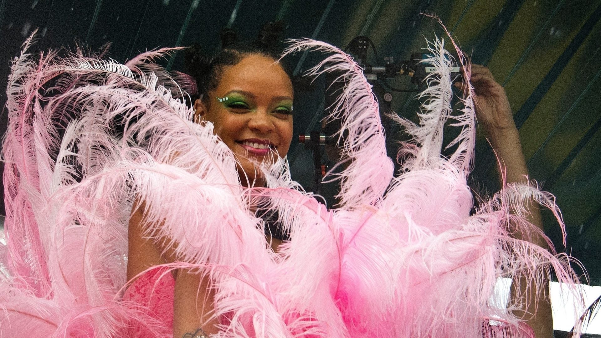 Rihanna Spotted in Massive Pink Feathers At Crop Over in Barbados