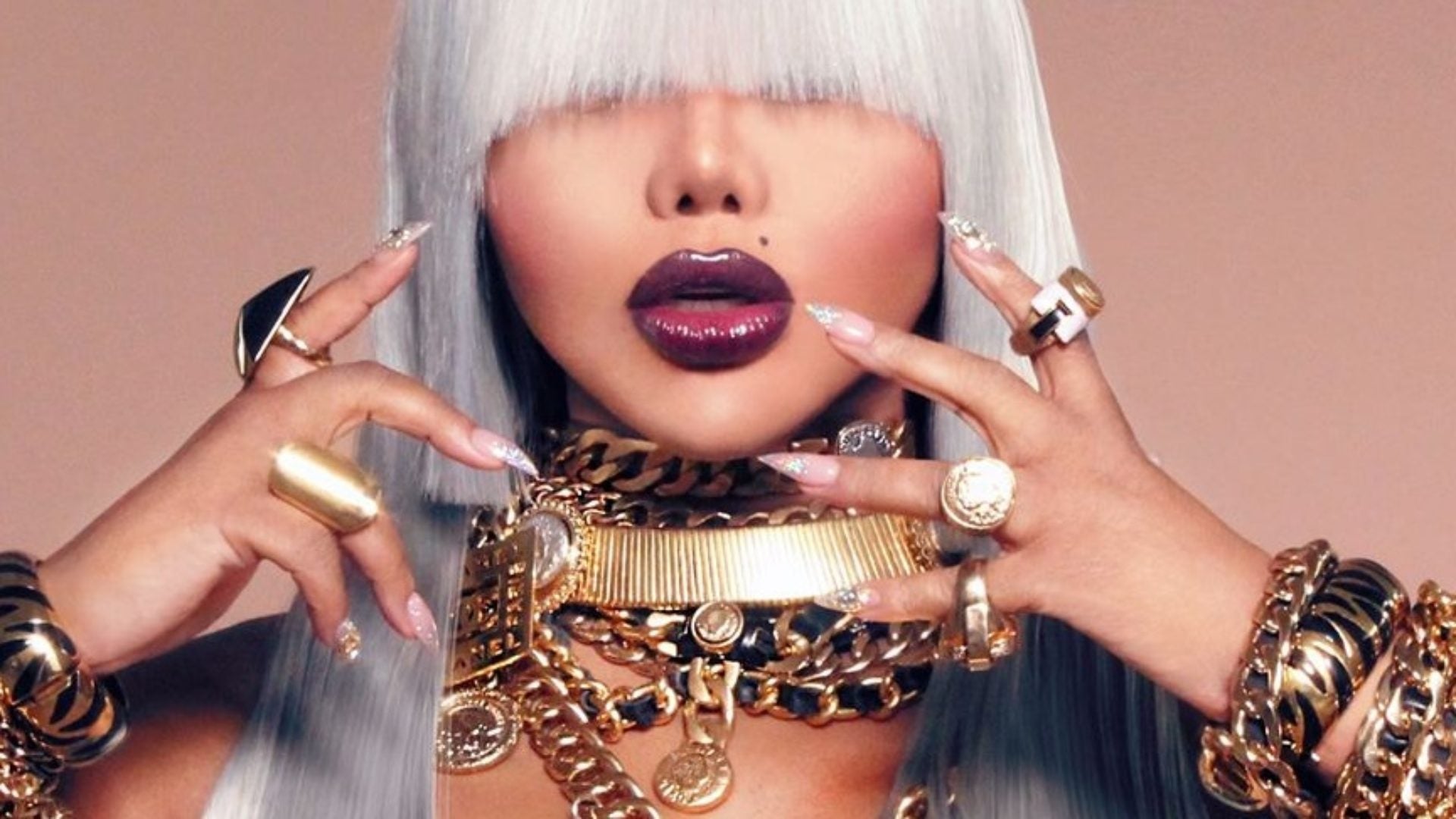 Lil Kim Previews A Promotional Shot Dripped In Chanel For Her Next Album "9"