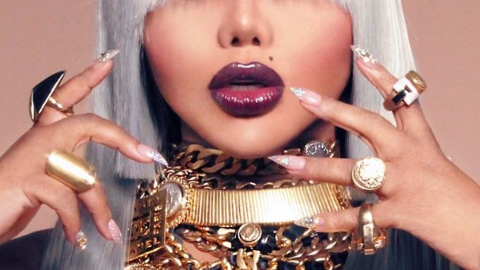 Lil Kim Previews A Promotional Shot Dripped In Chanel For Her Next Album "9"