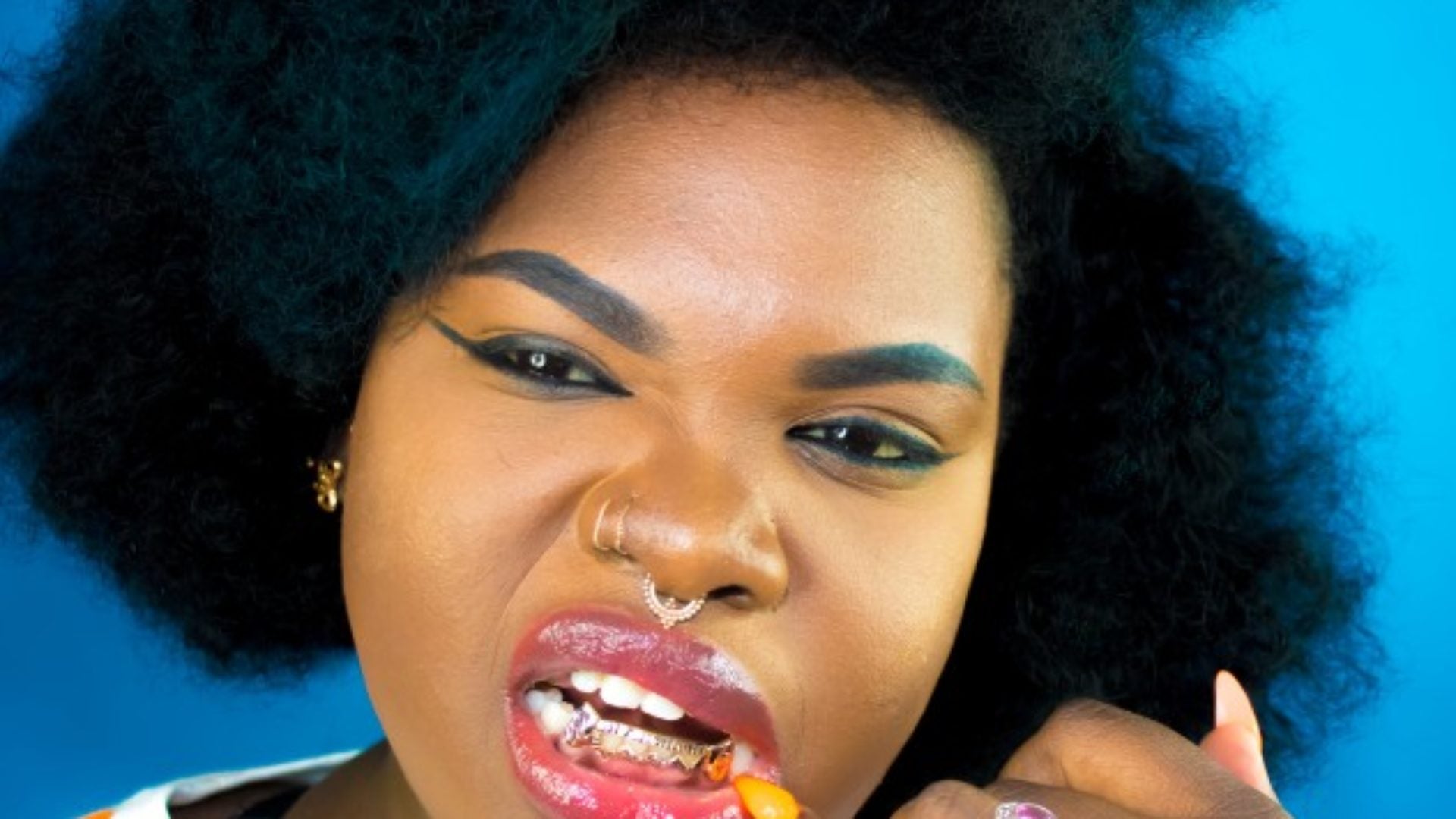 These 15 Beauties In Grillz Make Us Want To Get Some Tooth Bling
