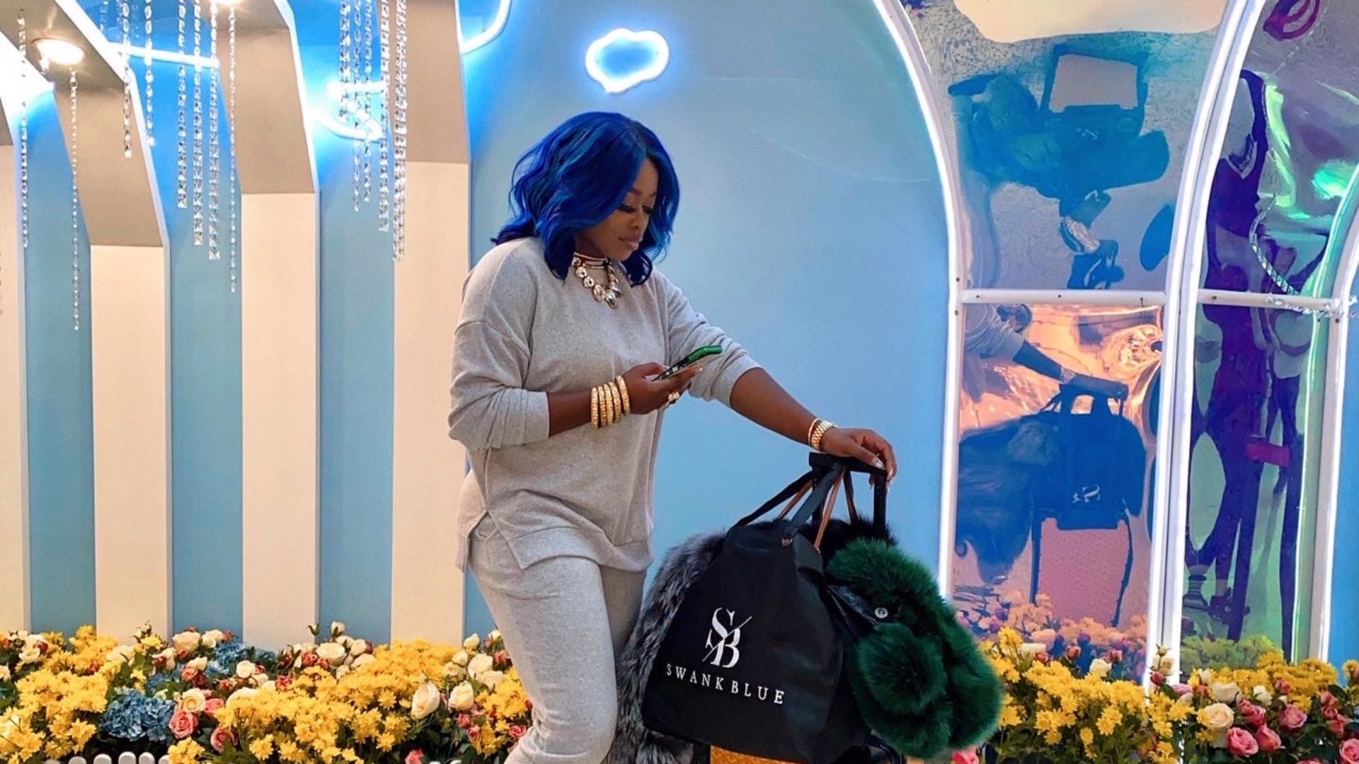 Stylist Olori Swank Dishes On What's In Her Carry-On Bag