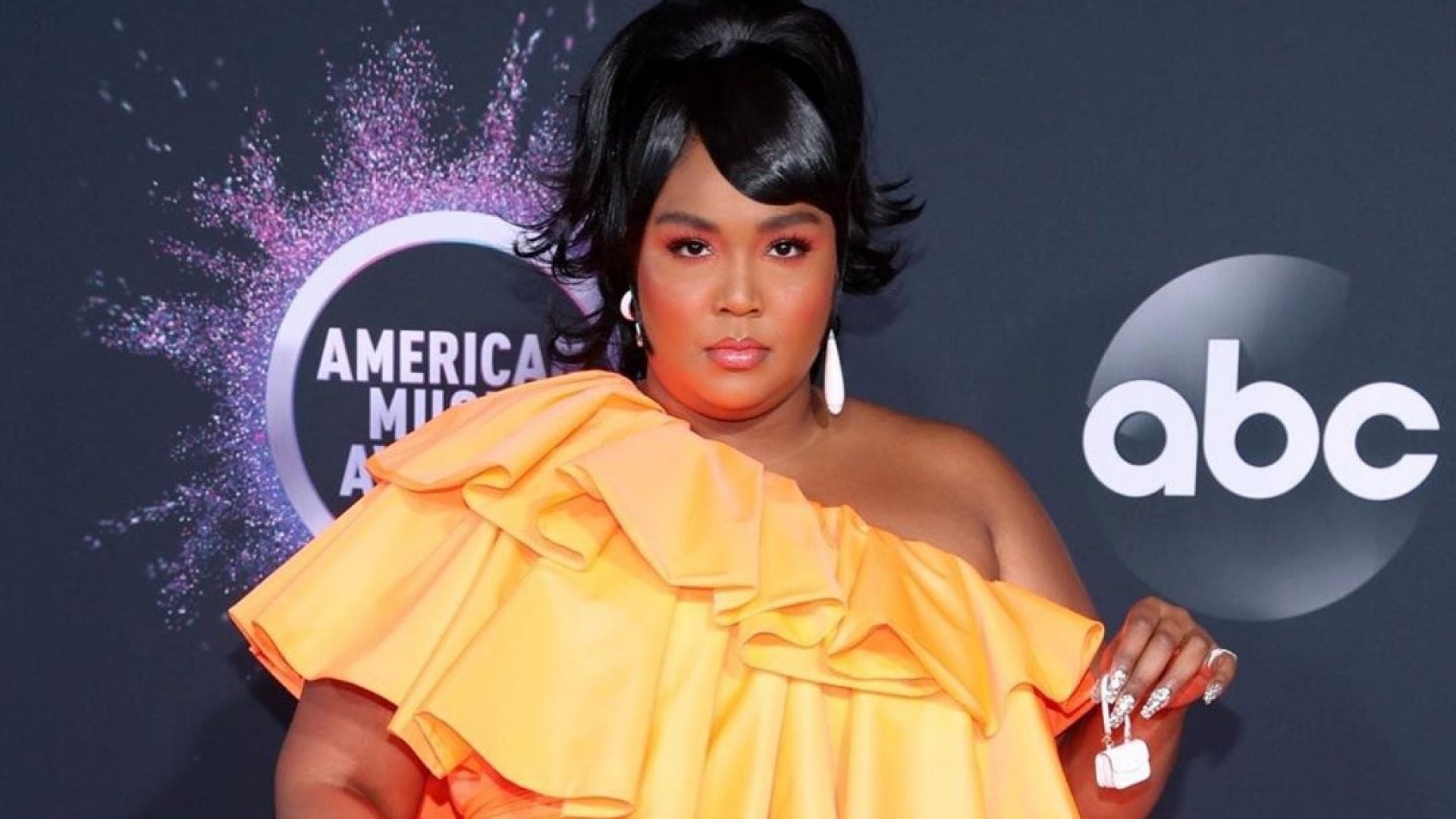 Lizzo Finally Reveals What She Carries In Her Tiny Bag