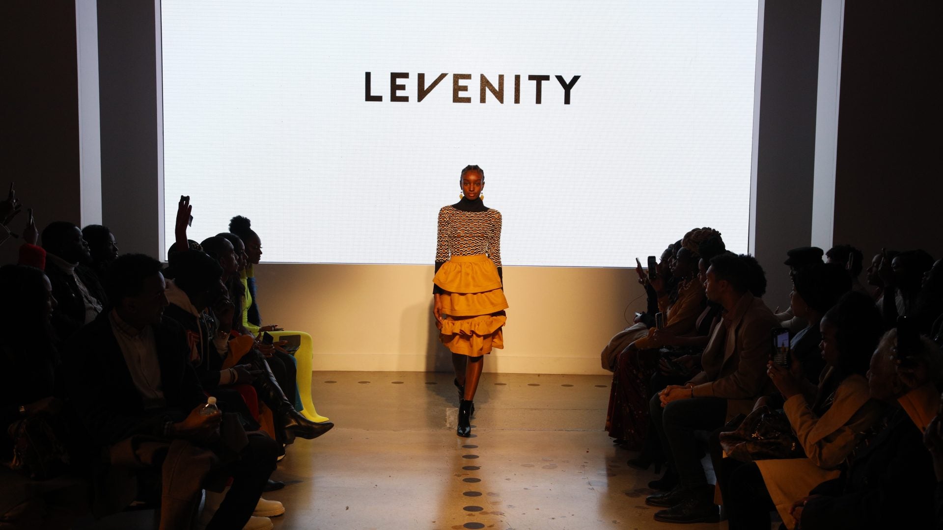 Designer Venny Etienne of LEVENITY Presents A Vibrant Collection At ESSENCE Fashion House
