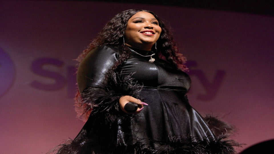 Lizzo Claps Back At Her Body Shamers In A New Workout Video Essence