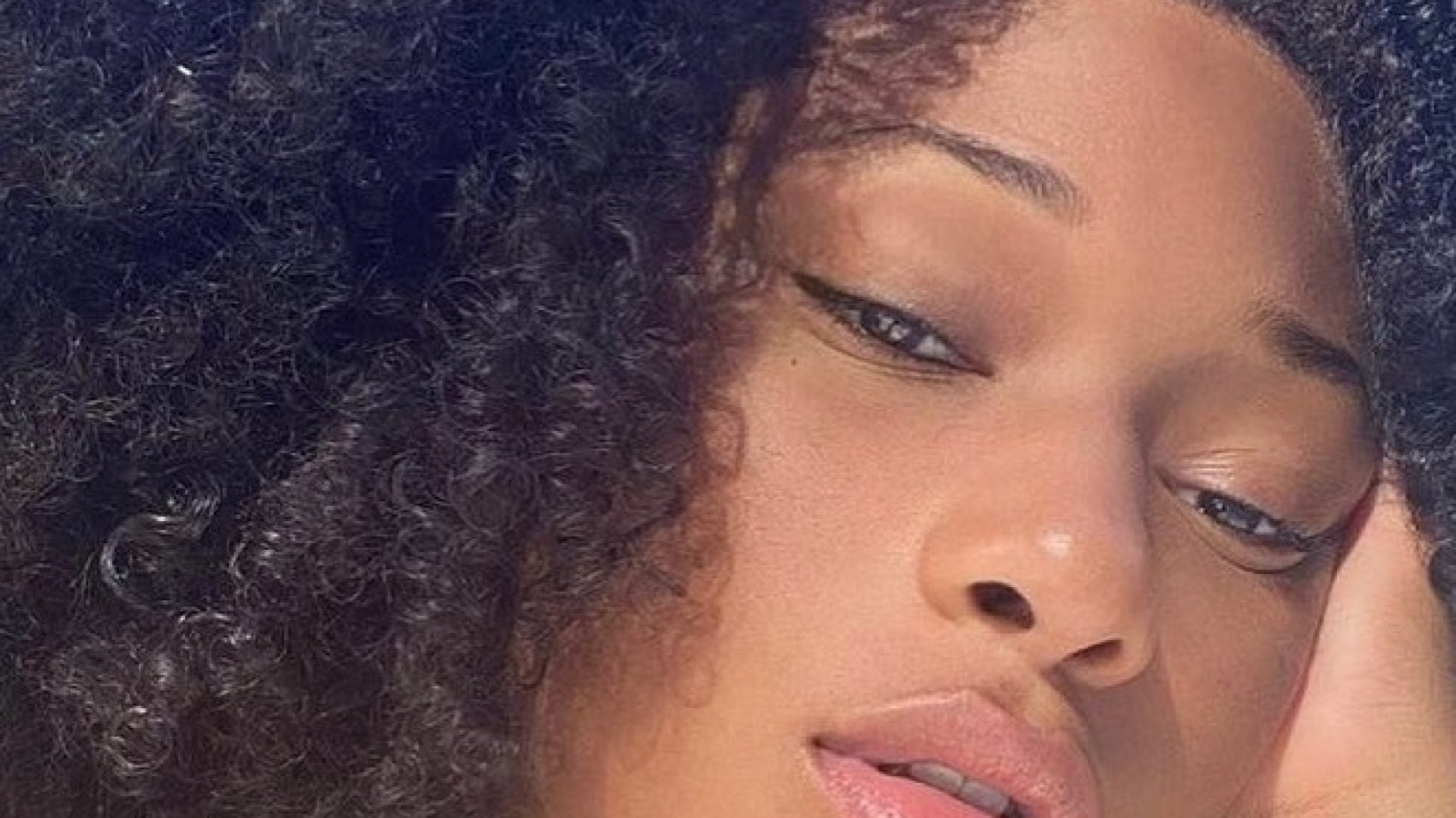 Megan Thee Stallion Loves Her Natural Hair—And We Do Too!