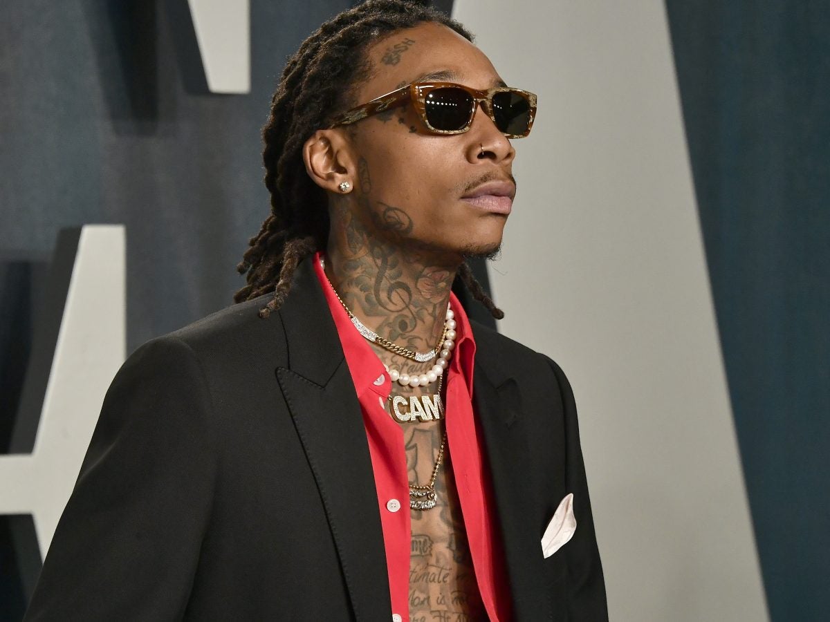 Wiz Khalifa Signs 25 College Athletes To NIL Deals - Essence | Essence