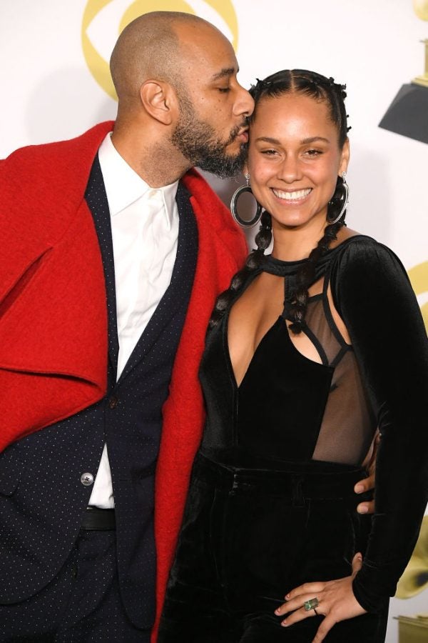 19 Photos Of Black Celebrity Couples Packing On The PDA