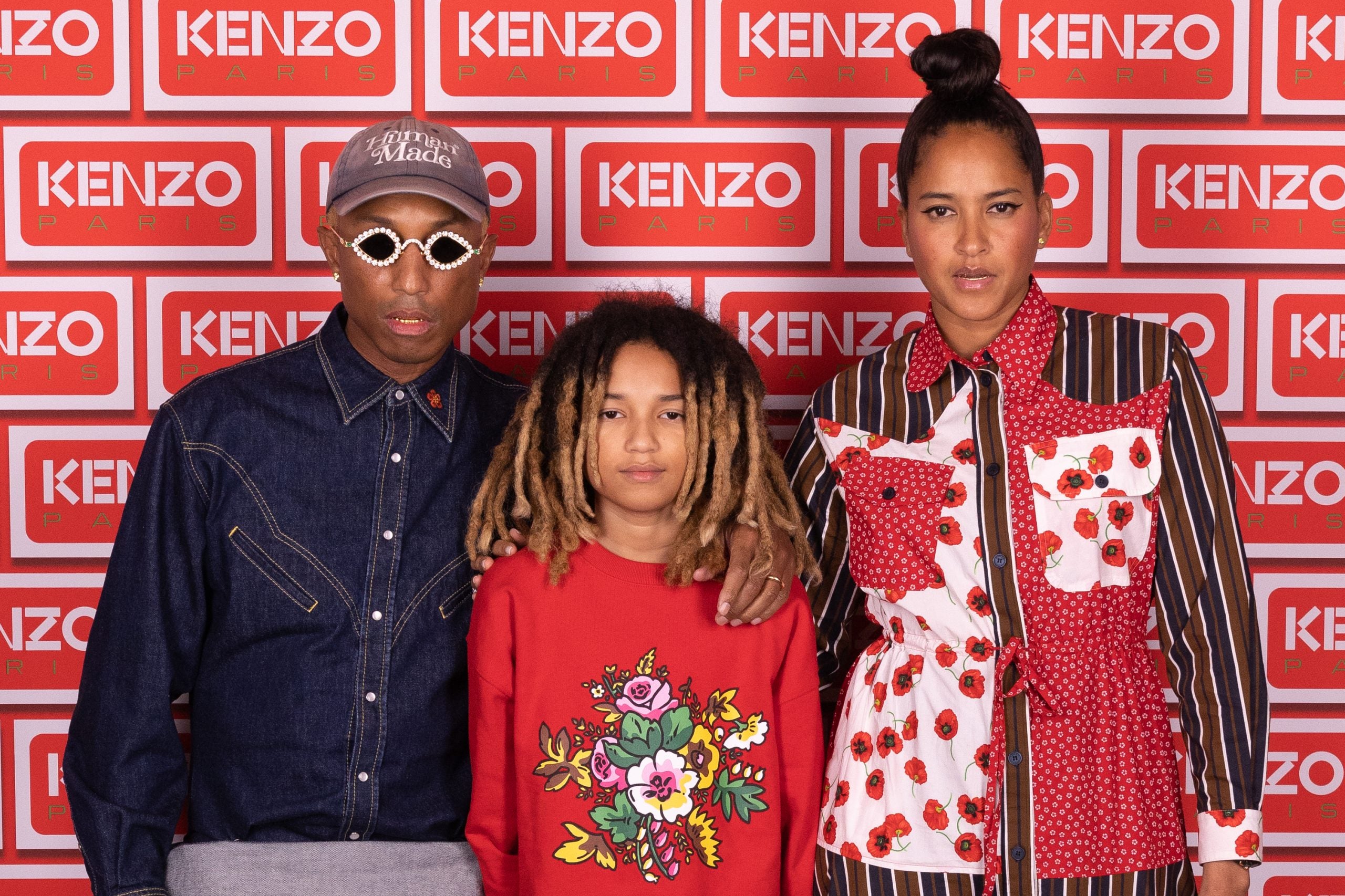 Pharrell Williams is joined by his wife Helen and son Rocket for a