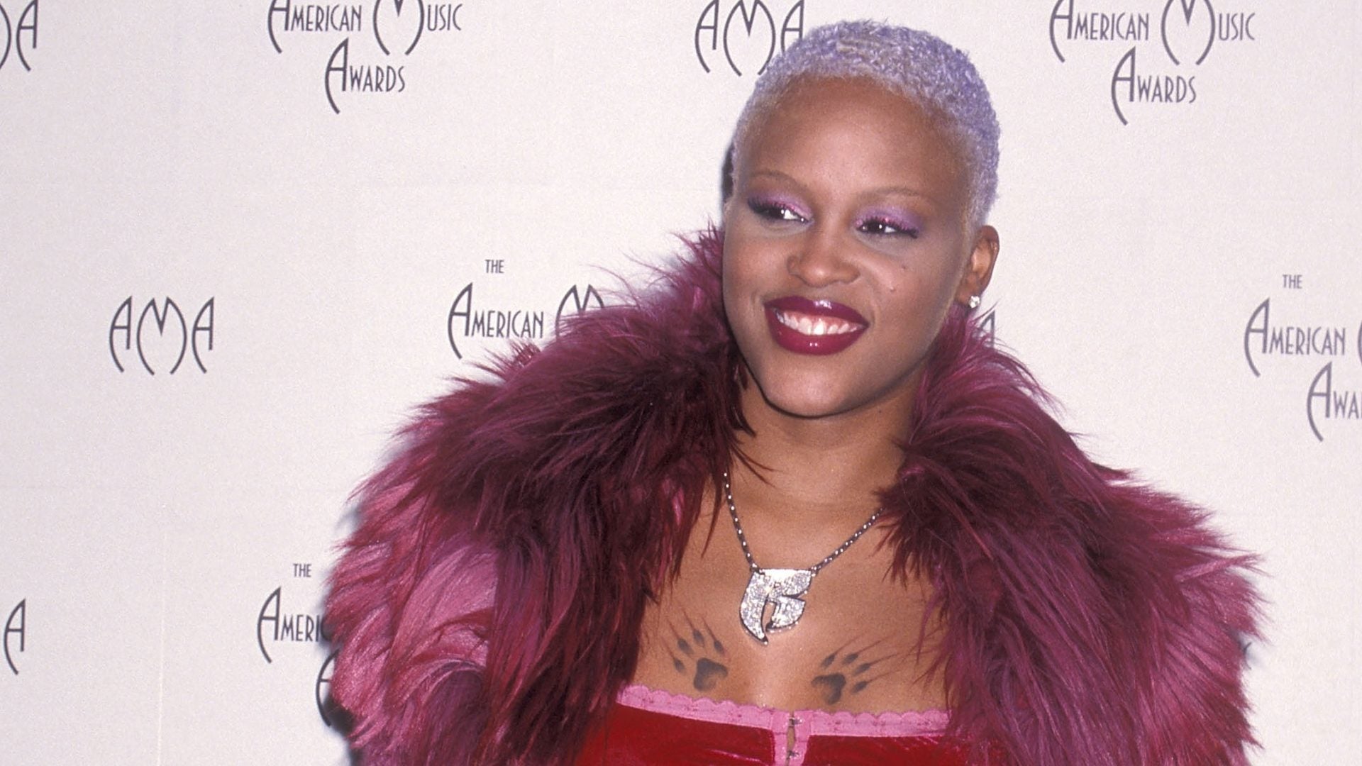 These 25 Iconic Fashion Moments From Female Rappers Are Unforgettable 