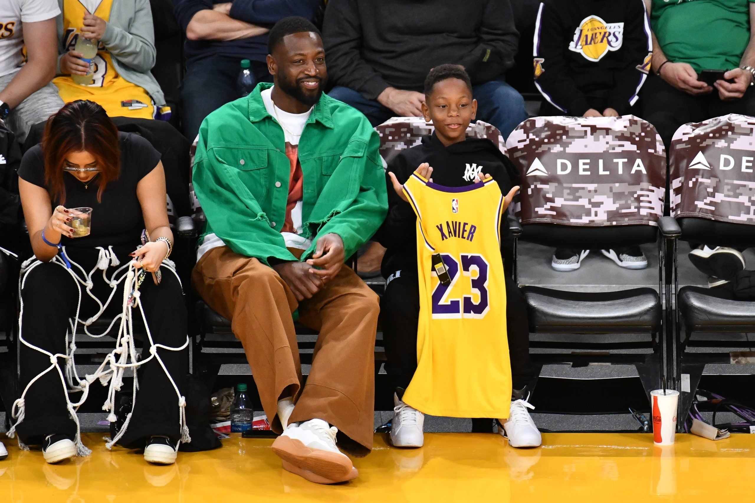 Dwyane Wade Steps Out With His Youngest Son Xavier For A Lakers Game ...