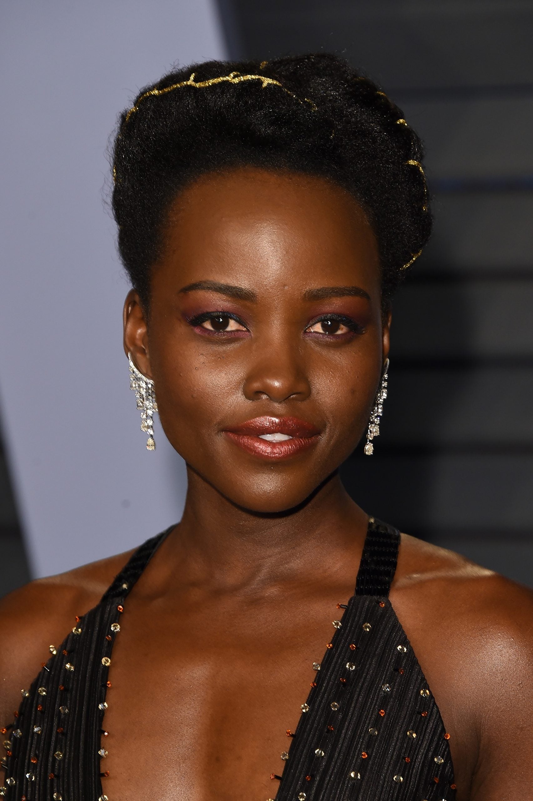 Lupita Nyong'o’s Most Iconic Beauty Looks | Essence