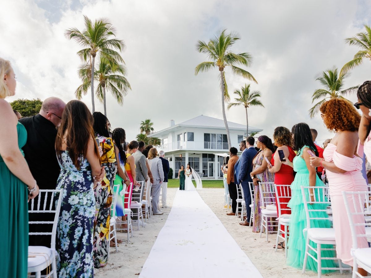 Bridal Bliss: Inside NFL Star Jonathan Jones And Andressa Barboza's Wedding On A Private Island