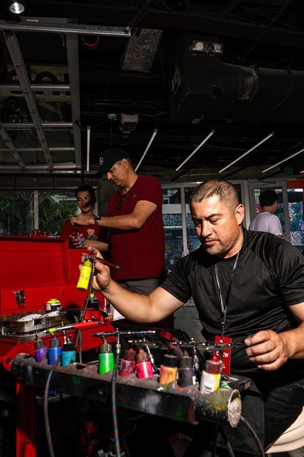 Inside HUGO’s Motorsport-Themed GARAGE During Miami Grand Prix 