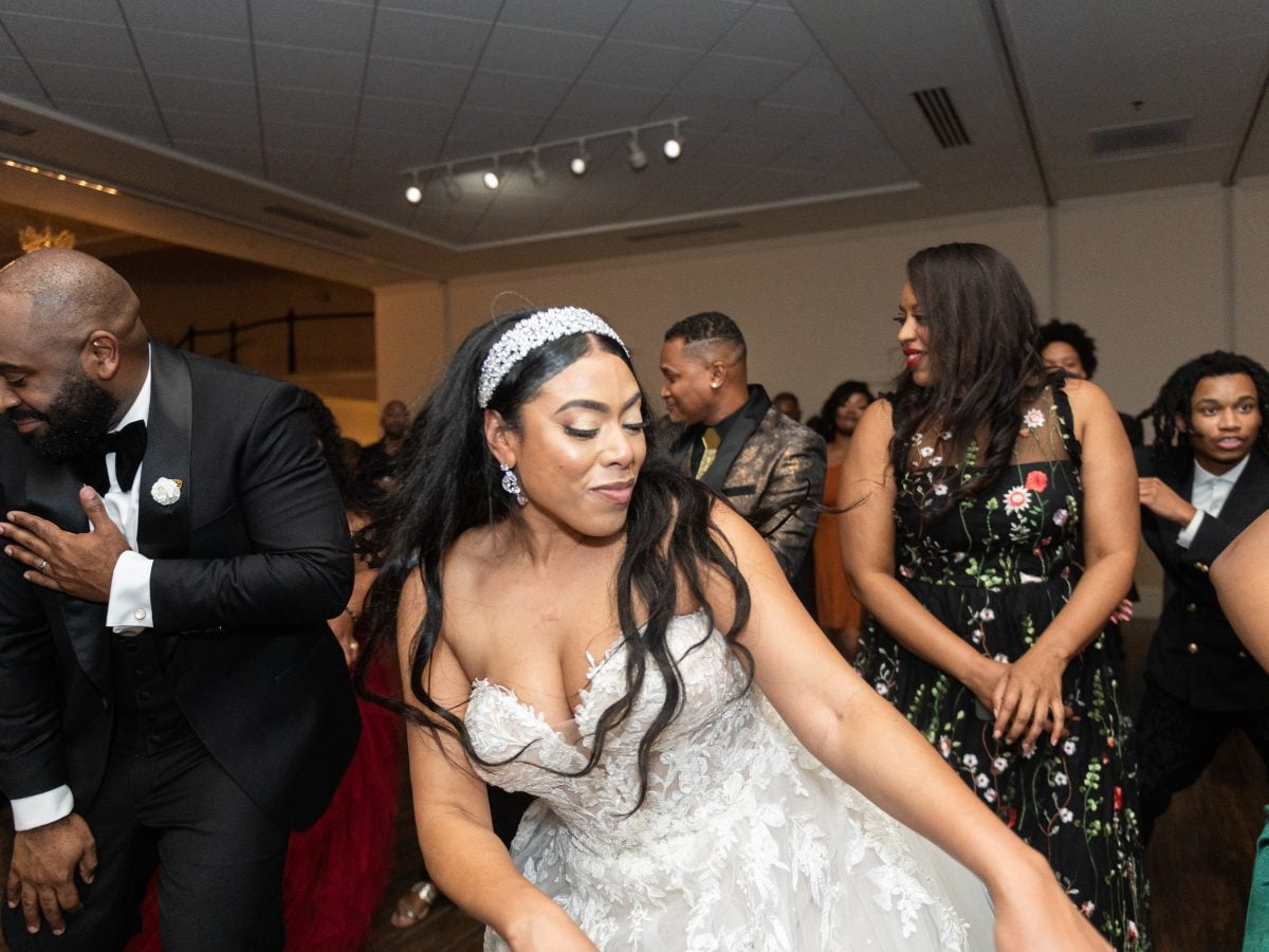 Bridal Bliss: Andrea And Ronel's Wedding Was A Full Fête With Masquerade Dancers And West Indian Flags