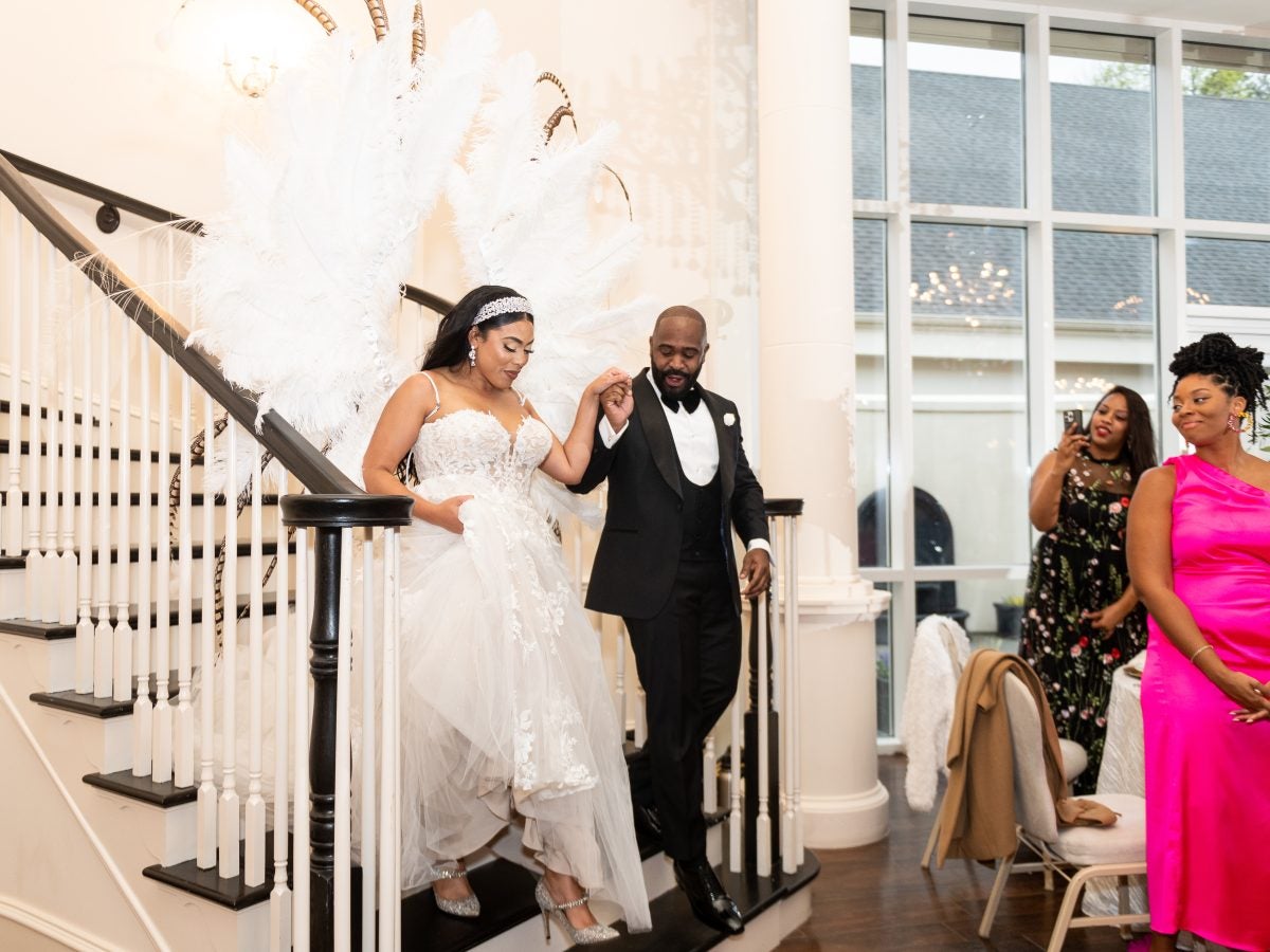 Bridal Bliss: Andrea And Ronel's Wedding Was A Full Fête With Masquerade Dancers And West Indian Flags