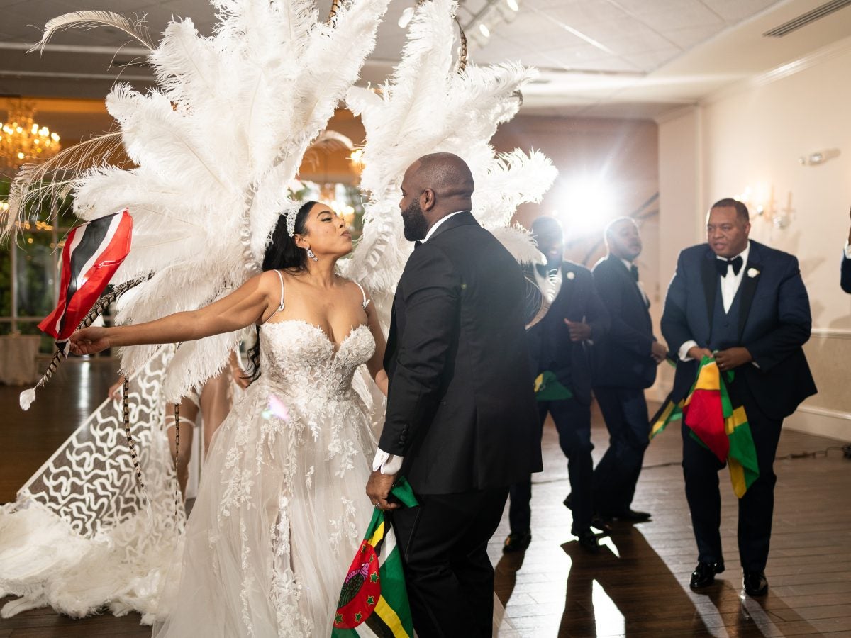 Bridal Bliss: Andrea And Ronel's Wedding Was A Full Fête With Masquerade Dancers And West Indian Flags