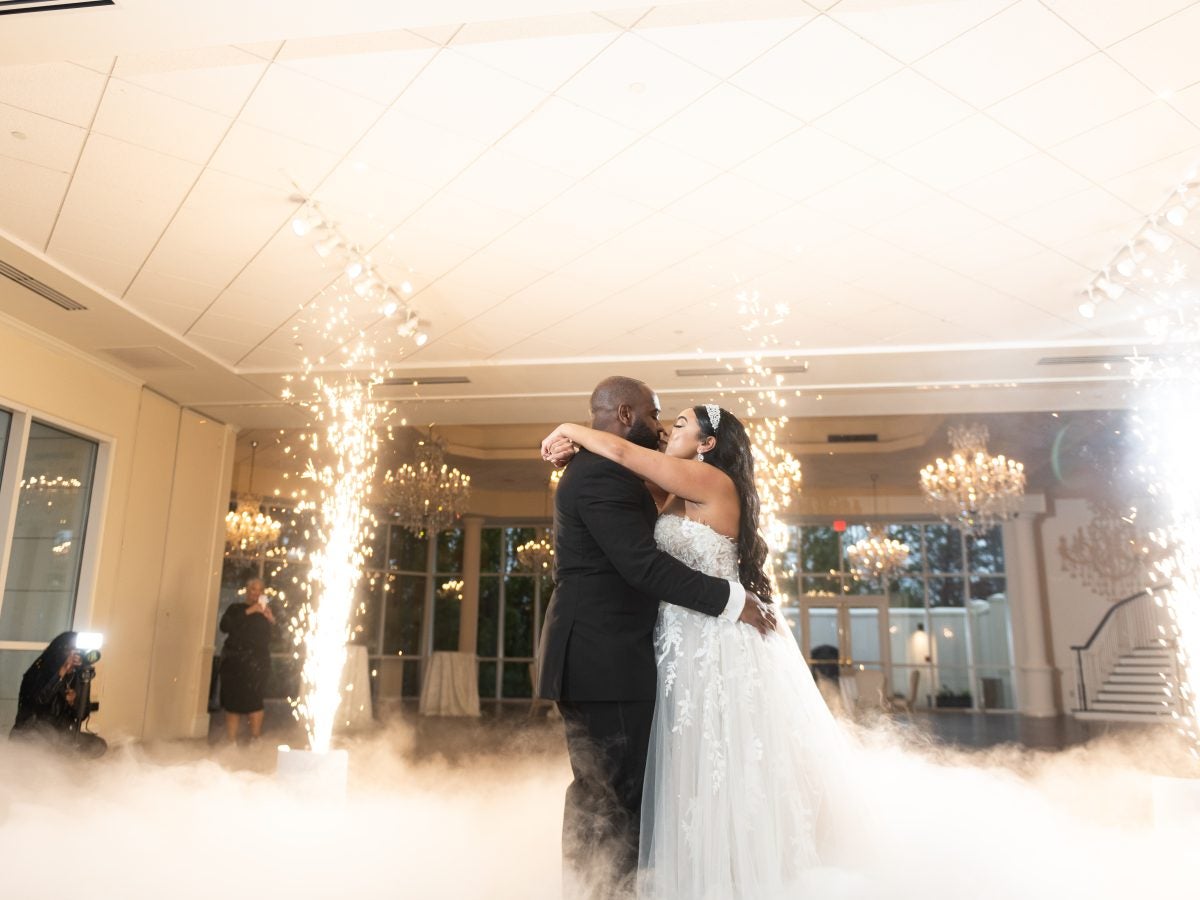 Bridal Bliss: Andrea And Ronel's Wedding Was A Full Fête With Masquerade Dancers And West Indian Flags