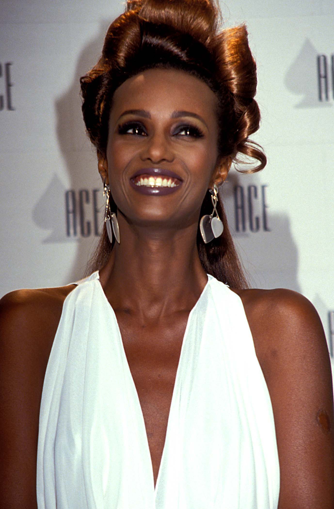 A Look Back At Iman’s Most Iconic Beauty Looks Of All Time