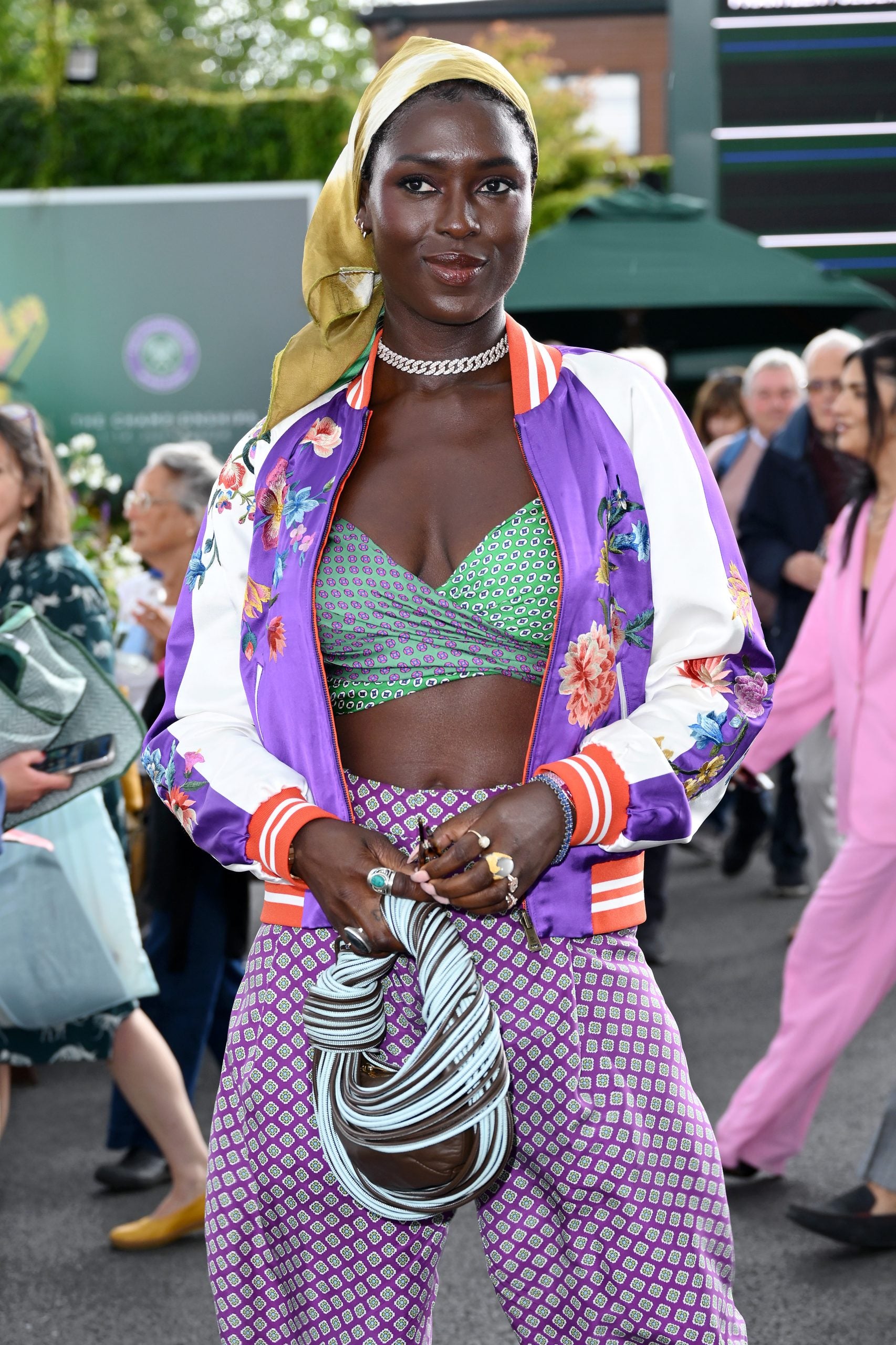 Jodie Turner-Smith Sports Protective Scarves At Wimbledon Tournament