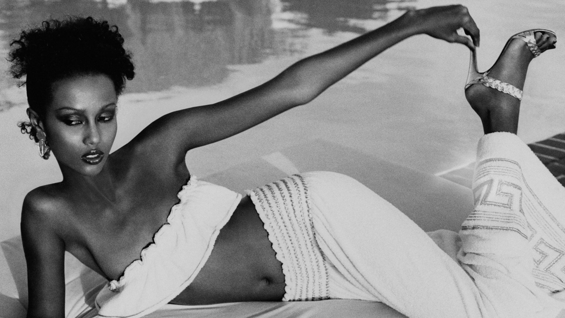 A Look Back At Iman’s Most Iconic Beauty Looks Of All Time