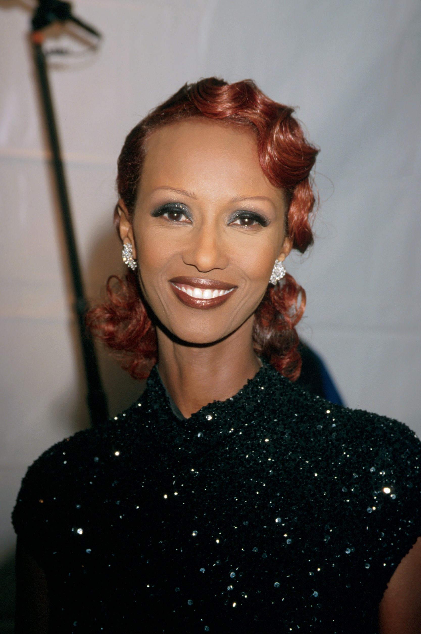 A Look Back At Iman’s Most Iconic Beauty Looks Of All Time