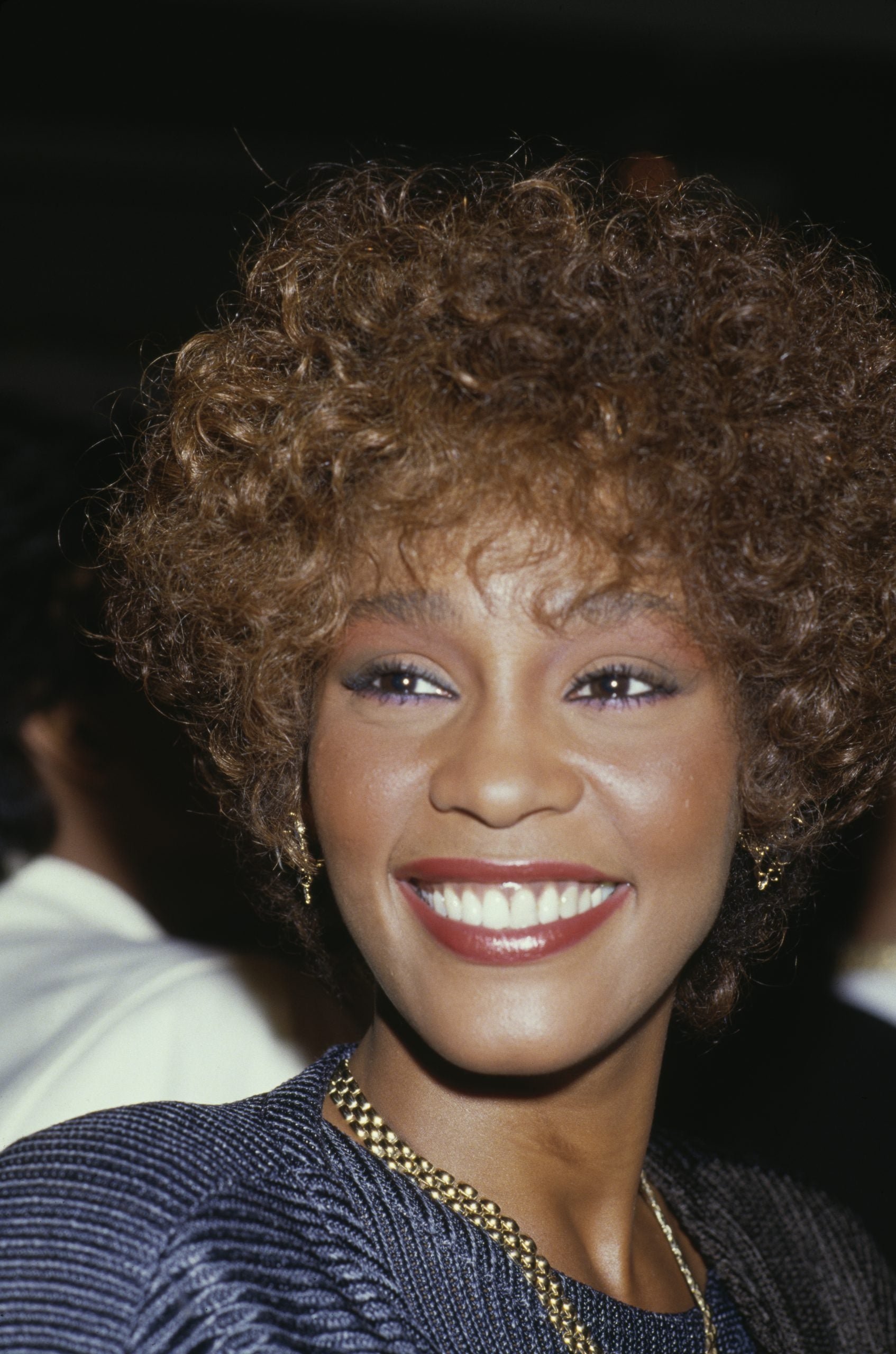 17 Of Whitney Houston’s Most Iconic Beauty Moments