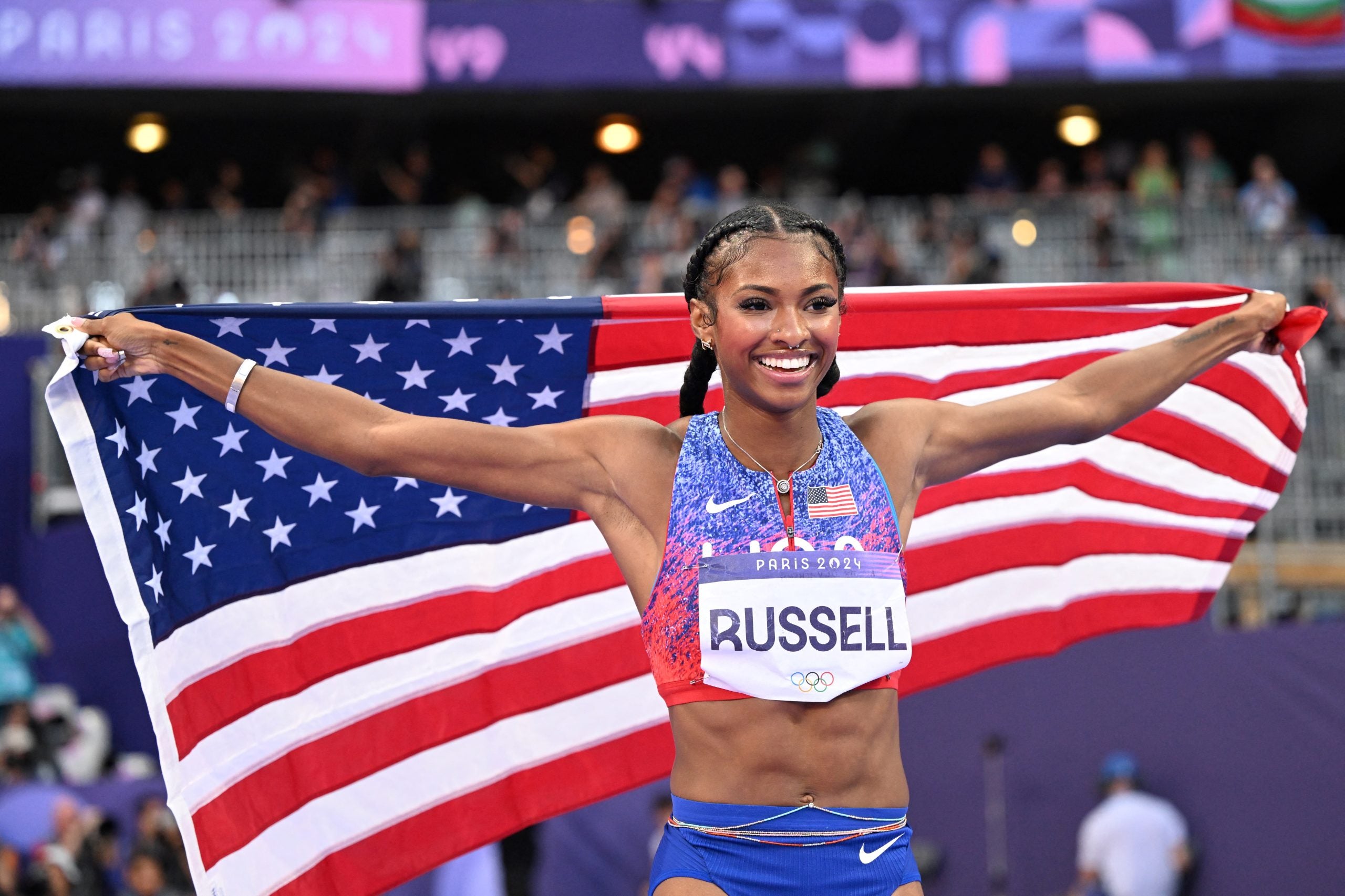 Masai Russell: An Olympic Champion Who Leaped Into The History Books