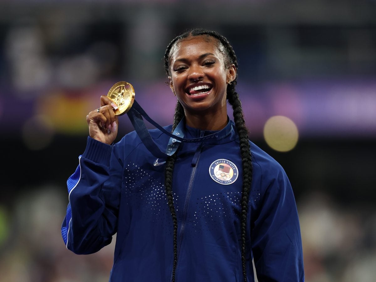 Masai Russell: An Olympic Champion Who Leaped Into The History Books