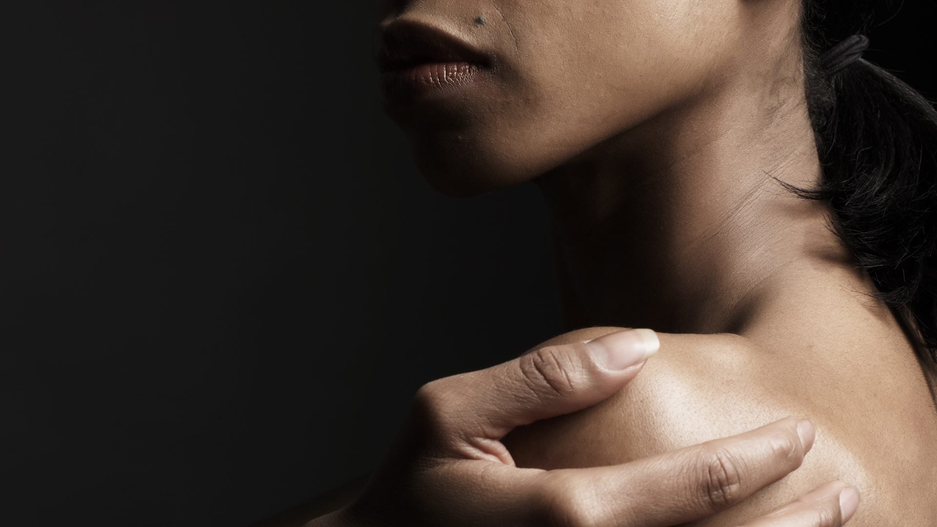 Here's What You Need To Know About Scar Treatments For Melanated Skin