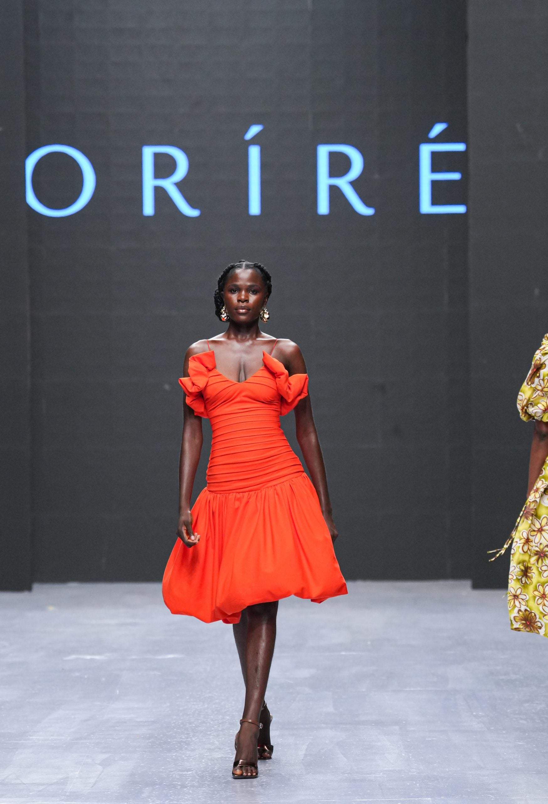 All The Trends At Lagos Fashion Week: Bubble Hems, Bold Metallics, And Kitschy Florals