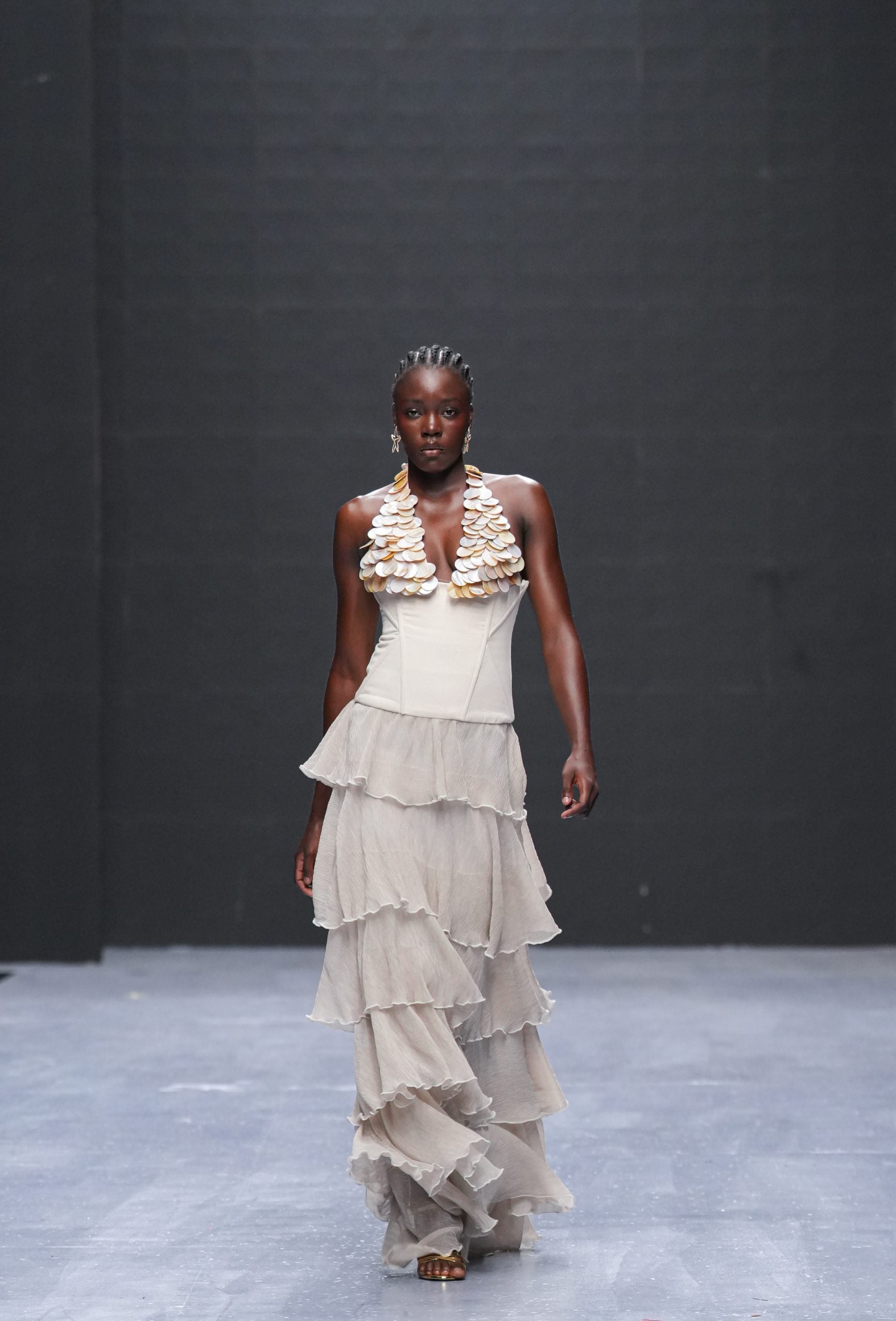 All The Trends At Lagos Fashion Week: Bubble Hems, Bold Metallics, And Kitschy Florals