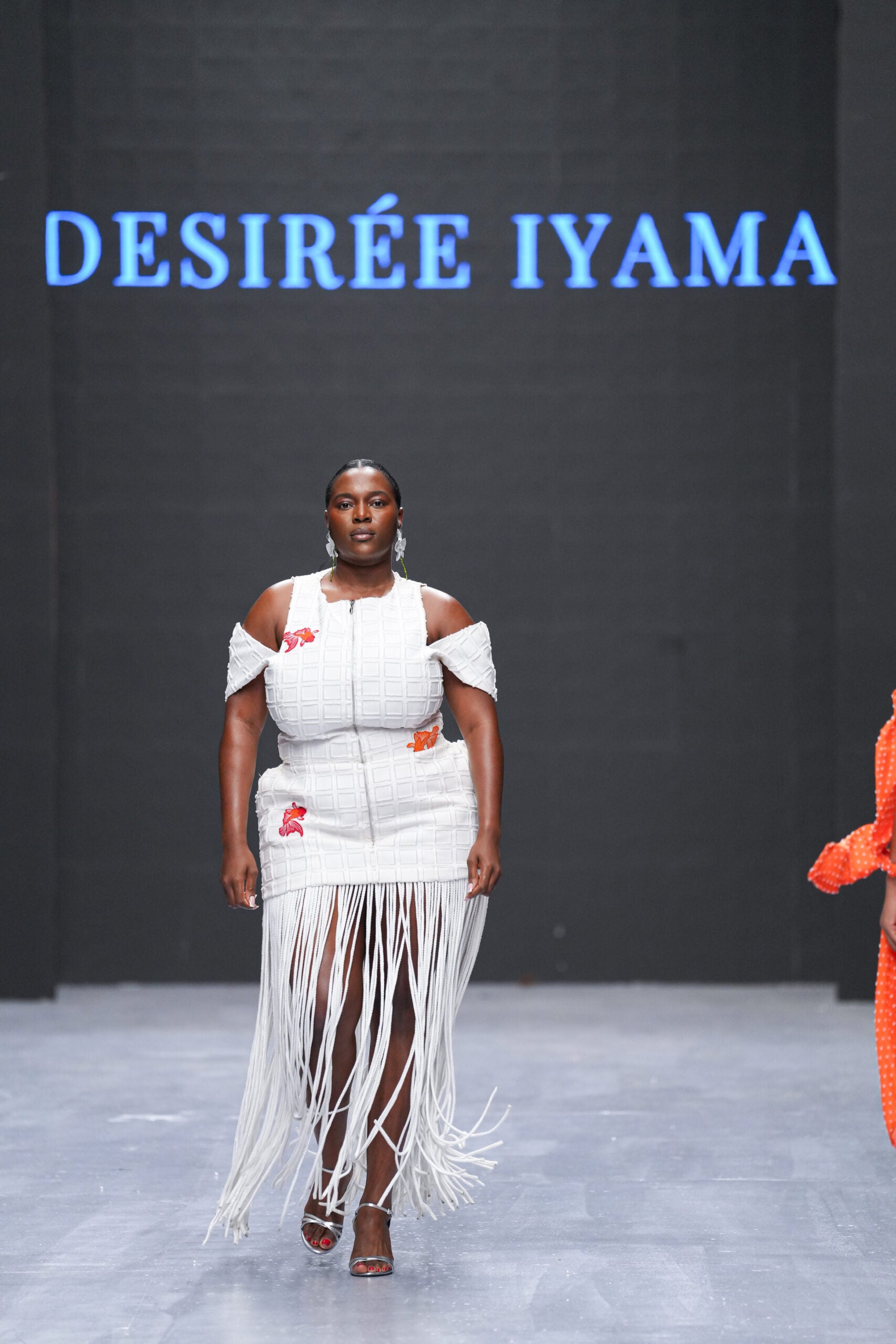 All The Trends At Lagos Fashion Week: Bubble Hems, Bold Metallics, And Kitschy Florals