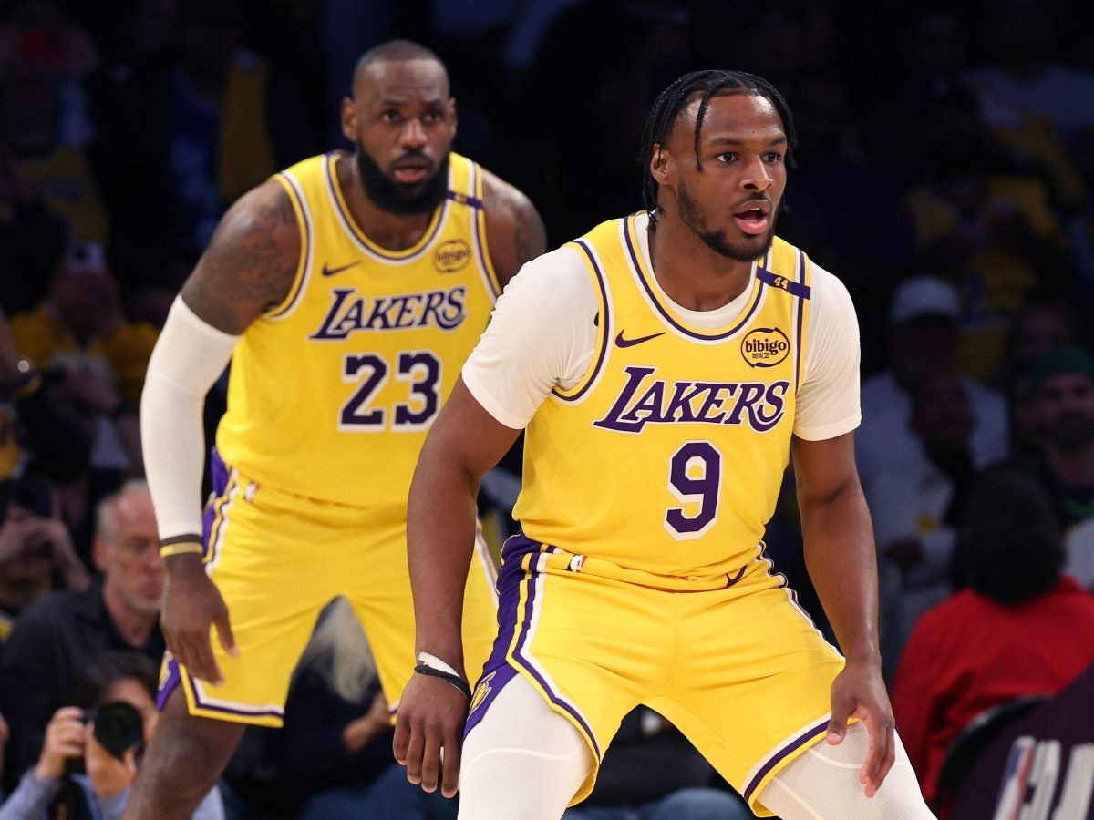 Sweet Photos Of LeBron And Bronny James Making NBA History As The First Father-Son Duo To Play Together