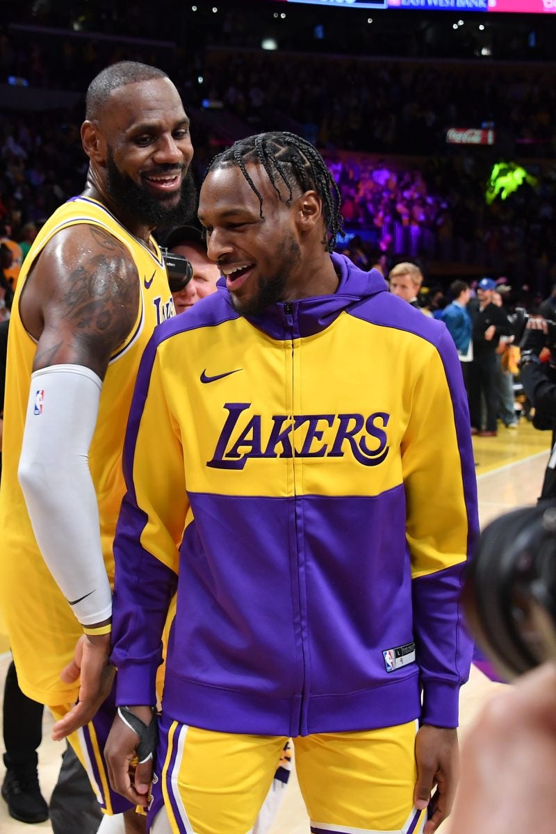 Sweet Photos Of LeBron And Bronny James Making NBA History As The First Father-Son Duo To Play Together