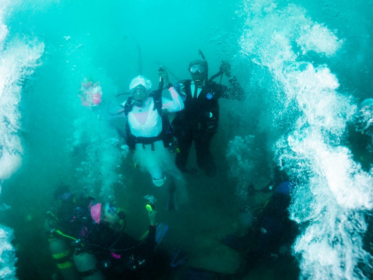 Bridal Bliss: Kim And Arthur Take Their Love Beneath The Waves In A Historic Underwater Wedding In Grenada