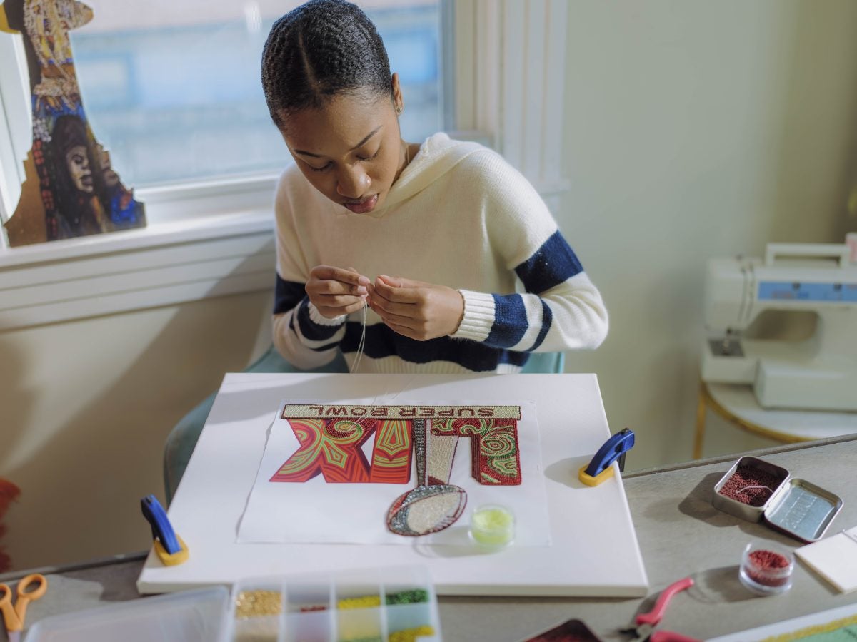 Meet 'Queen Tahj' Williams: The First Black Woman To Create The Logo And Theme Art For Super Bowl LIX