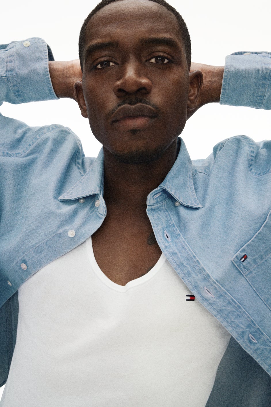 Essence Fashion Digest: Damson Idris Stars In Tommy Hilfiger Campaign, Rebag Launches New Walmart Partnership, And More